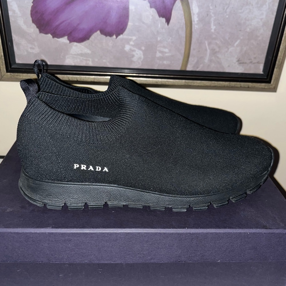 Mint condition (worn about 3 times) Wms Prada sneakers. Originally $620 Sz 7.5